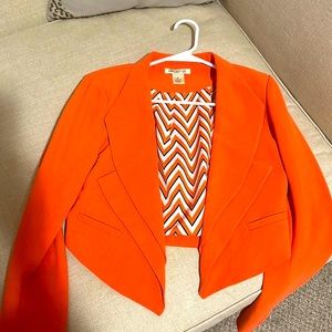 Arden B. Orange blazer.